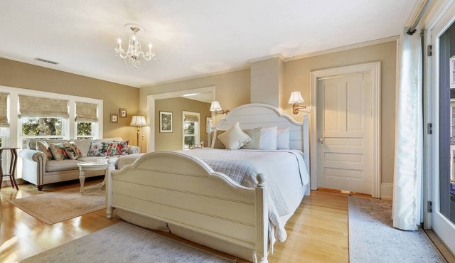 Spacious King bed suite with private balcony.