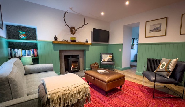 Stylishly renovated Croft house with uninterrupted views of fields, hills & sea