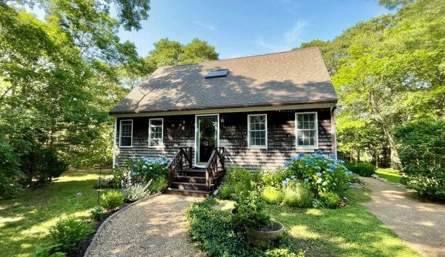 Sunny 3 bedroom cape with large deck, porch and kayaks. Pet friendly.