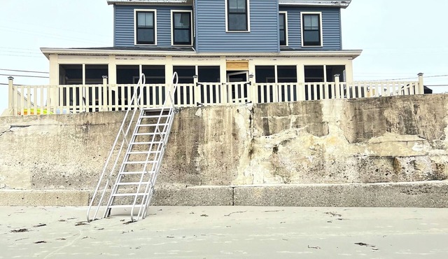 Sweeping ocean views, steps to the sand!