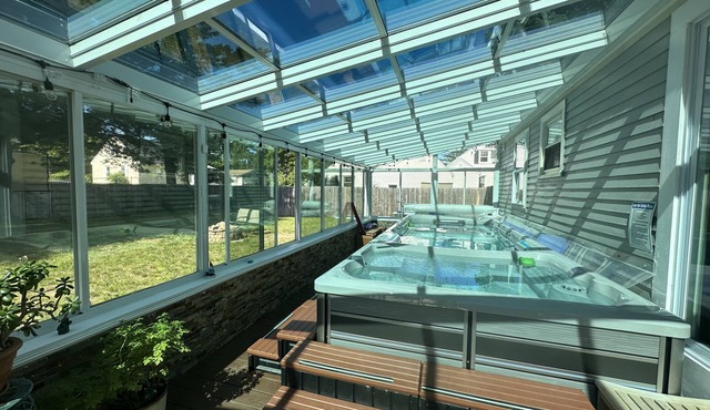 Swim spa under the starry night with pool/hot tub/sauna