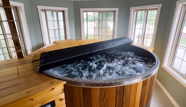 Sylvan Lake escape for 2: private island, indoor hot tub, 84' pier