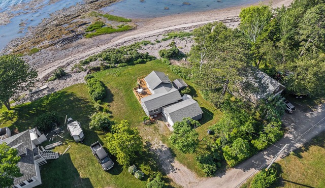 The Beach Pea 2 BR/1 BA Beachside bungalow feet from the Maine shore.