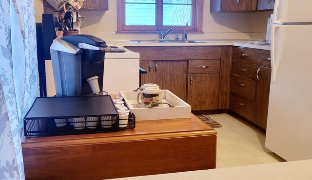 The Cozy Cottage is nestled in a charming neighborhood for the perfect get-away.
