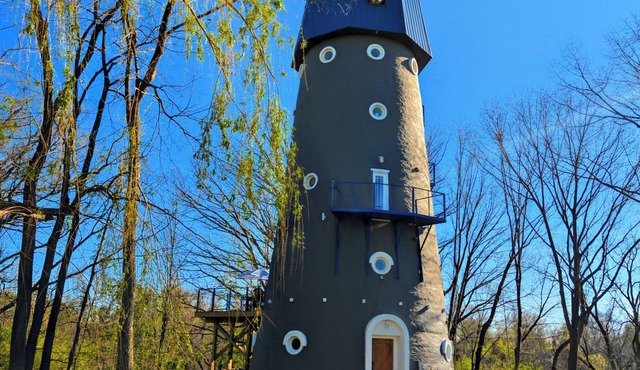The Grand Landmark: 5-Story Historic Windmill Retreat