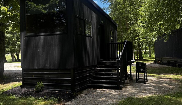 The Riverbed - Modern riverside cabin retreat in the heart of Hocking Hills — where firepit evenings and nature's best adventures await just outside your door