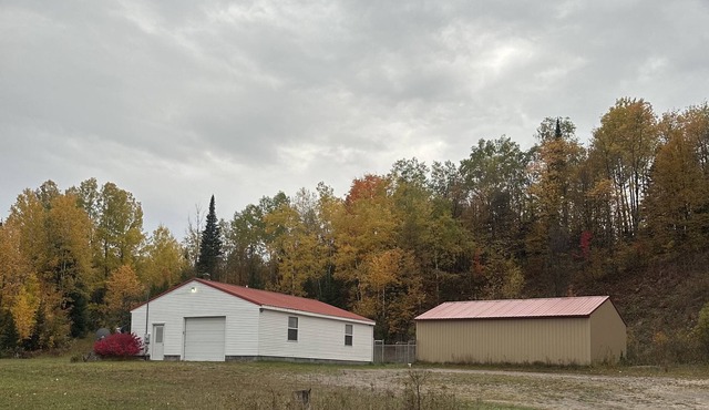 The snow has arrived! Cook’s Getaway across from Snowmobile Trails