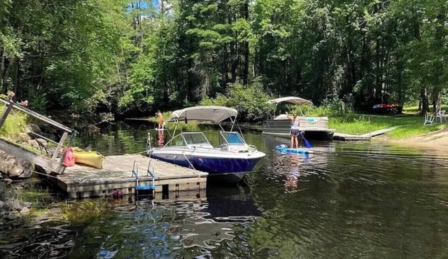 The Ultimate Two-Lake Access Bungalow: Peaceful Riverfront Living