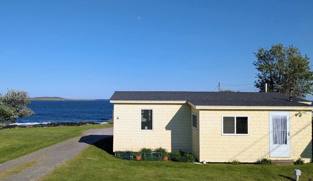 The Yellow Cottage is a 2-bedroom little getaway located right on its own private beach.