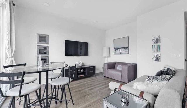 Top Floor Condo w/Water Views + Walk to Beach