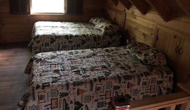 Unique Birch Island camp on Indian Pond in St. Albans, Maine