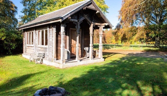Unique Norwegian cabin perched above the River Findhorn with a stunning view