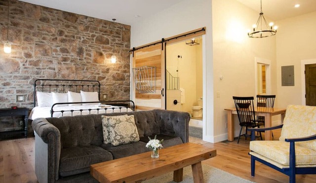 Unique Rustic Suite with Jacuzzi Tub, Kitchen, Fireplace, and Living Room