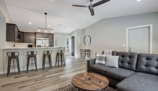 Up North Living! Fully renovated one-level living home in wooded lot near lake.