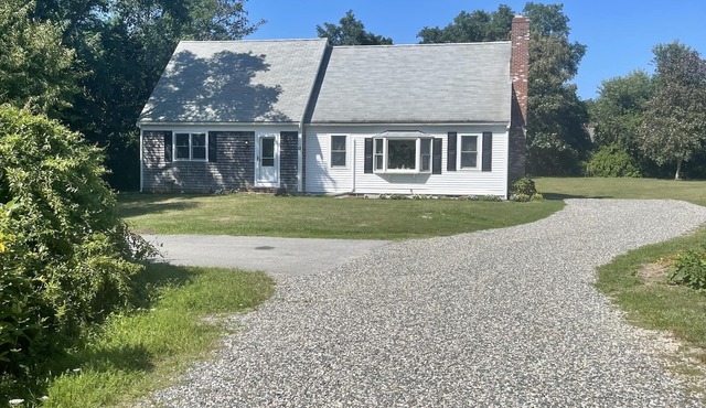 Walk to Beach, Home with Central A/C. Private Acre+ Lot