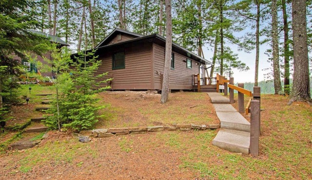 Waterfront cabin with Plum Lake views, private dock, beach access & kayaks
