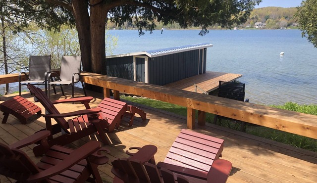 Waterfront home and guest cottage on Lake Leelanau. Dog ok. Sleeps 11.